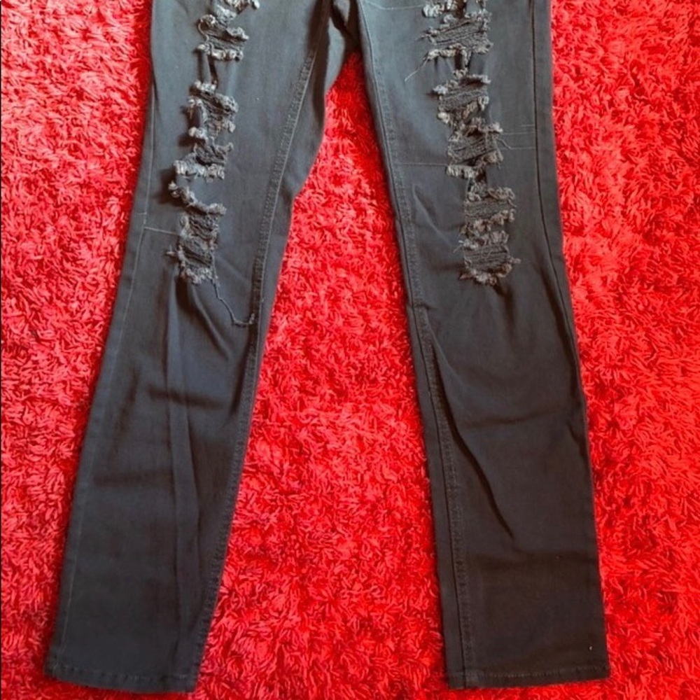Ripped Light Blue Denim Jeans